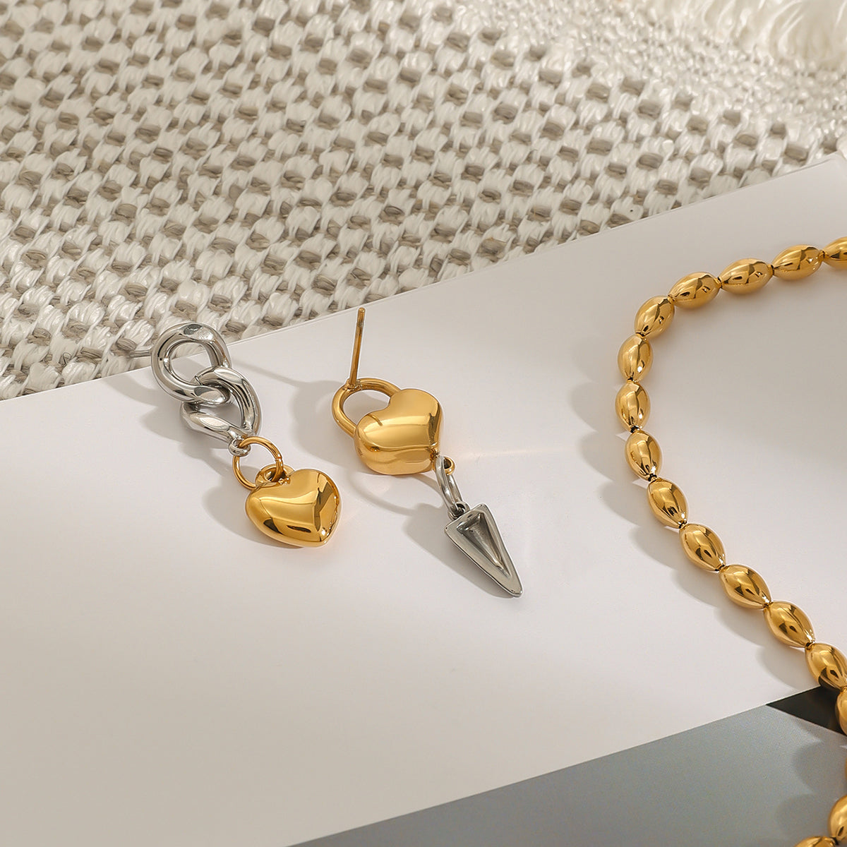 Nyra Heart Dangler Premium Earrings - 18K Gold Plated