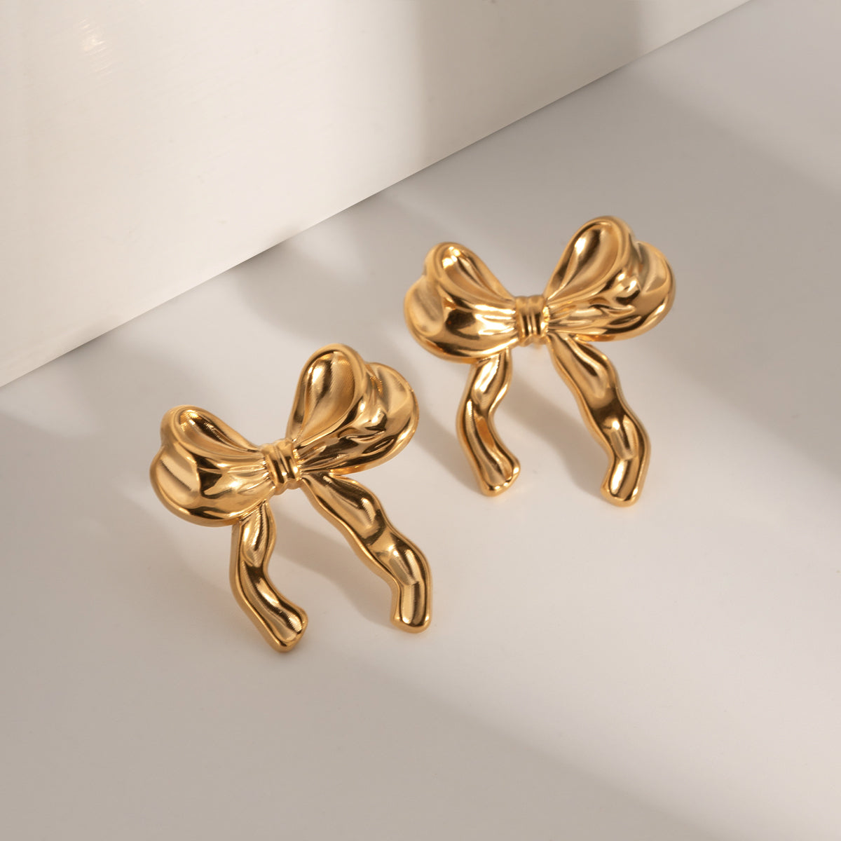 Amia Bow Studs Premium Earrings - 18K Gold Plated