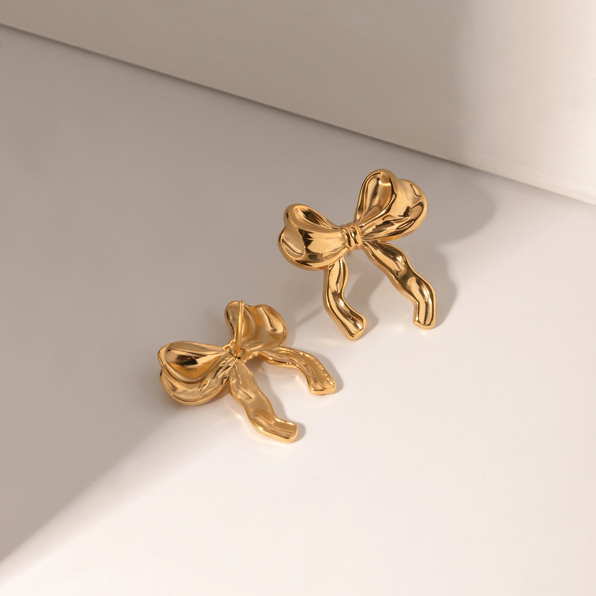 Amia Bow Studs Premium Earrings - 18K Gold Plated
